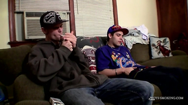 Sexy amateurs smoking cigarettes as they stroke cocks