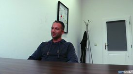 Gay tattooed jock giving a handjob to the director