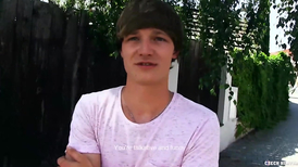 Gay lad takes off his beanie and gives a car blowjob