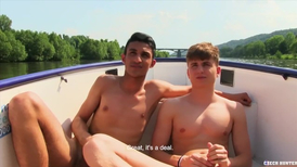 Interracial gay action on the boat for two teens
