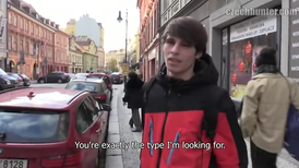 Teen gay man with lng hair talking outside of a store
