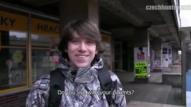 Teen lad with long hair interviewed at the station